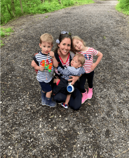 Jennifer smiles with her three children