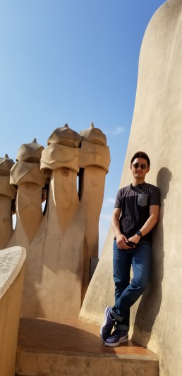 Alex smiles while visiting Gaudi's Casa Batllo