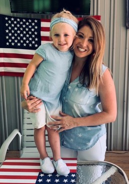 Cara on Independence Day with her daughter