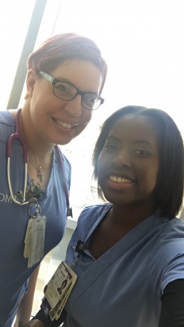 Mpande smiles with her coworker at UPMC East.