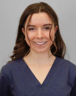 Headshot of a smiling woman.